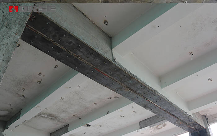 Strengthening of beams and slabs with steel plate Strengthening of beams and slabs with steel plate