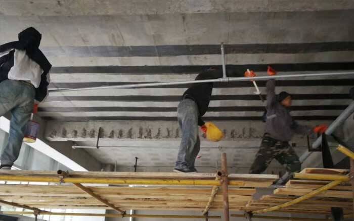 Gulf bridge corrosion repair by carbon fiber sheet Gulf bridge corrosion repair by carbon fiber sheet