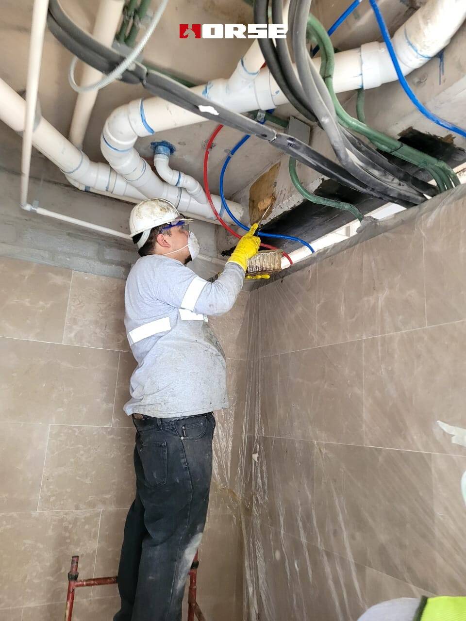 Carbon Fiber Strengthening Holes in an Apartment Carbon Fiber Strengthening Holes in an Apartment